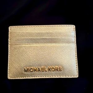 MK card holder. Holds three cards and ID window.